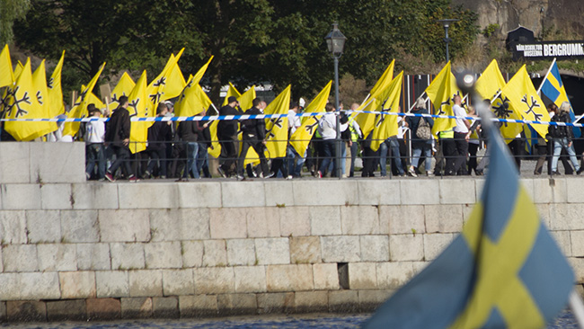 Flagga i när och fjärran. Foto: Jakob Bergman / Nyheter Idag