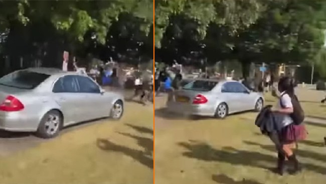 Här attackerar den ilskna pappan skolbarn med sin bil